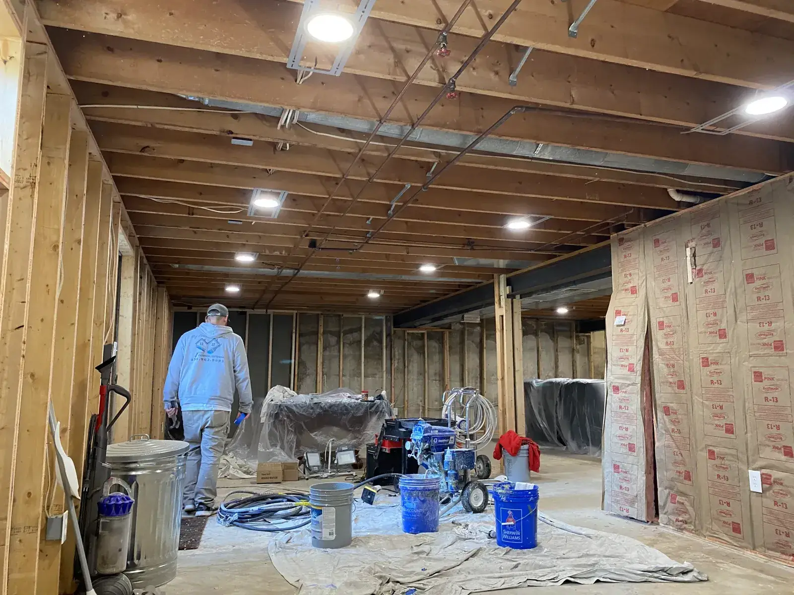 Before: basement ceiling joists sprayed black