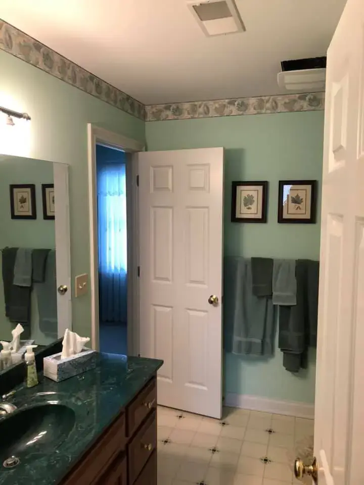 After: bathroom and bedroom painted light green