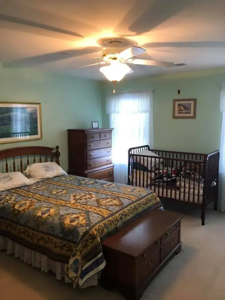 After: bathroom and bedroom painted light green