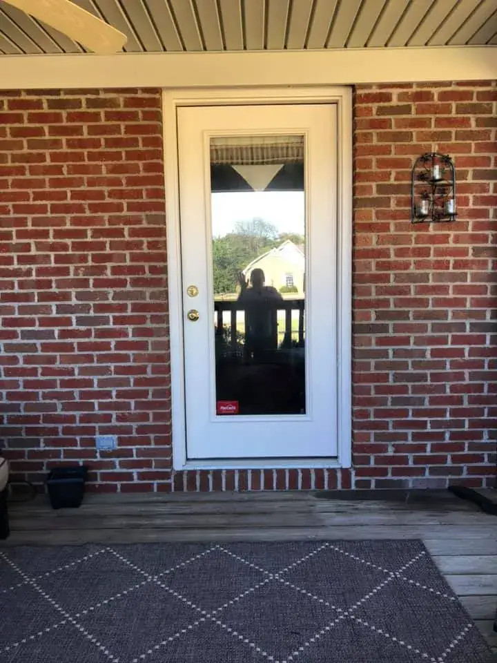 After: brick and siding ranch: entry, doors and garage door