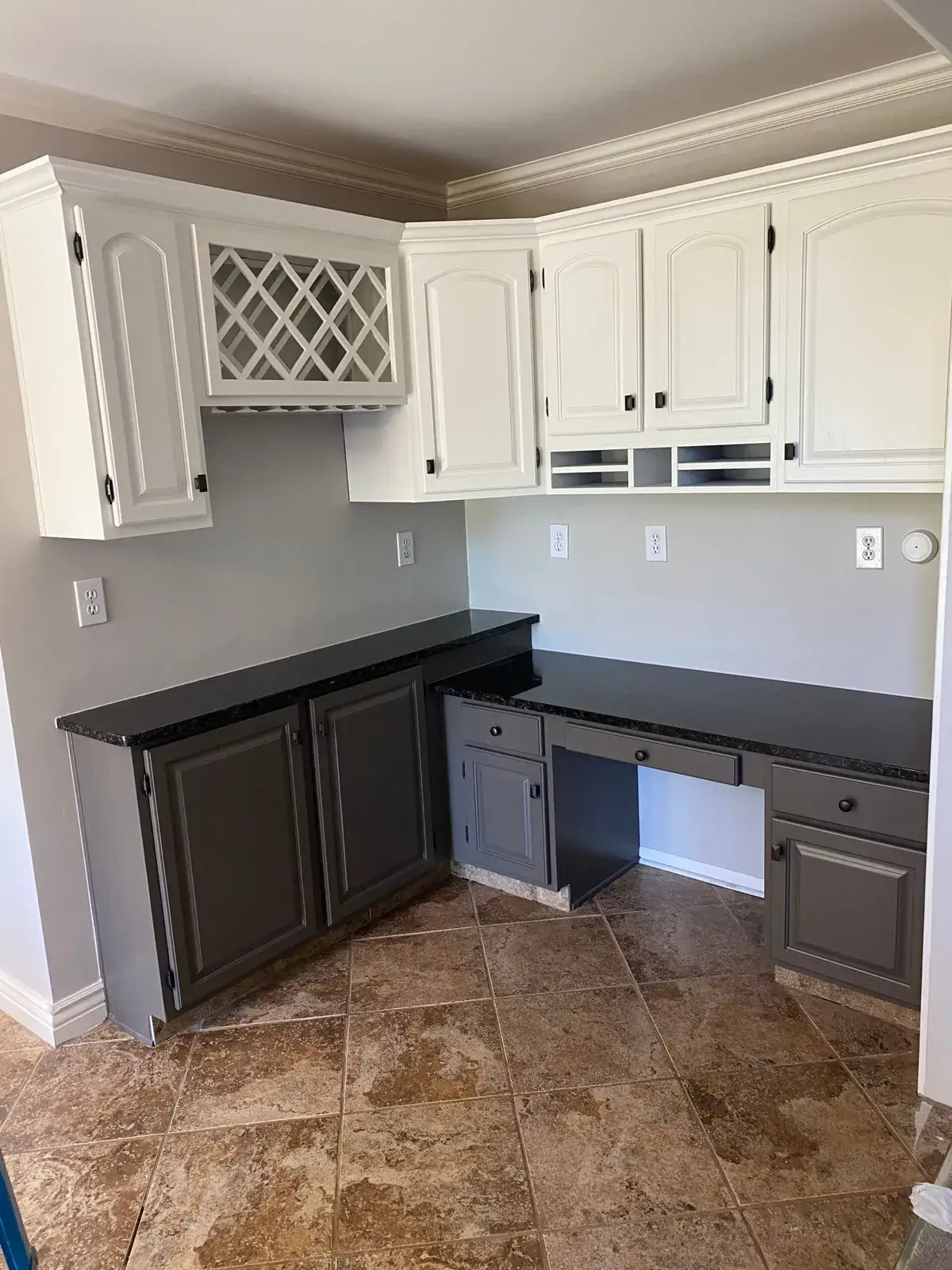 After: built-in desk cabinets painted dark