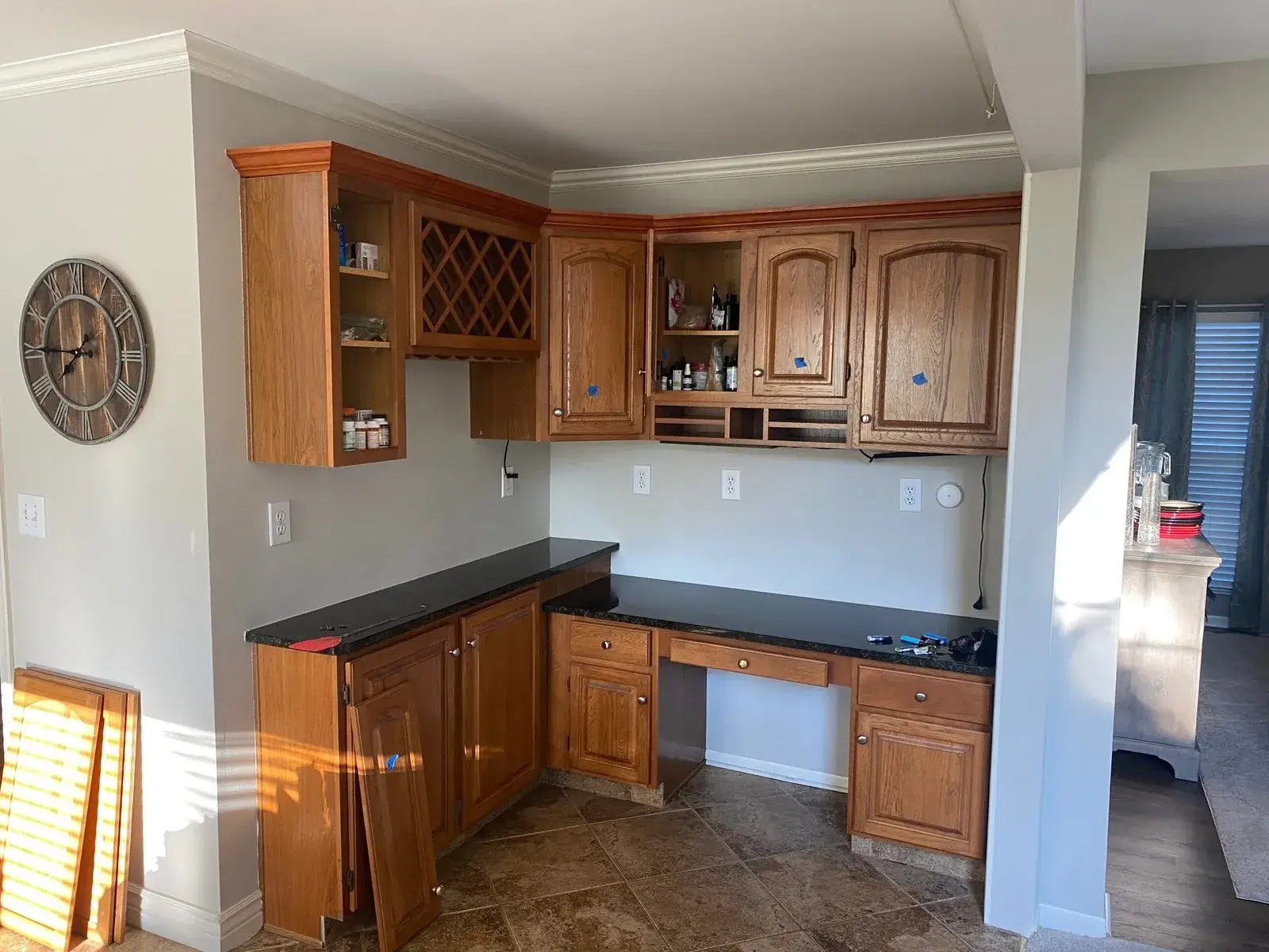 Before: built-in desk cabinets painted dark