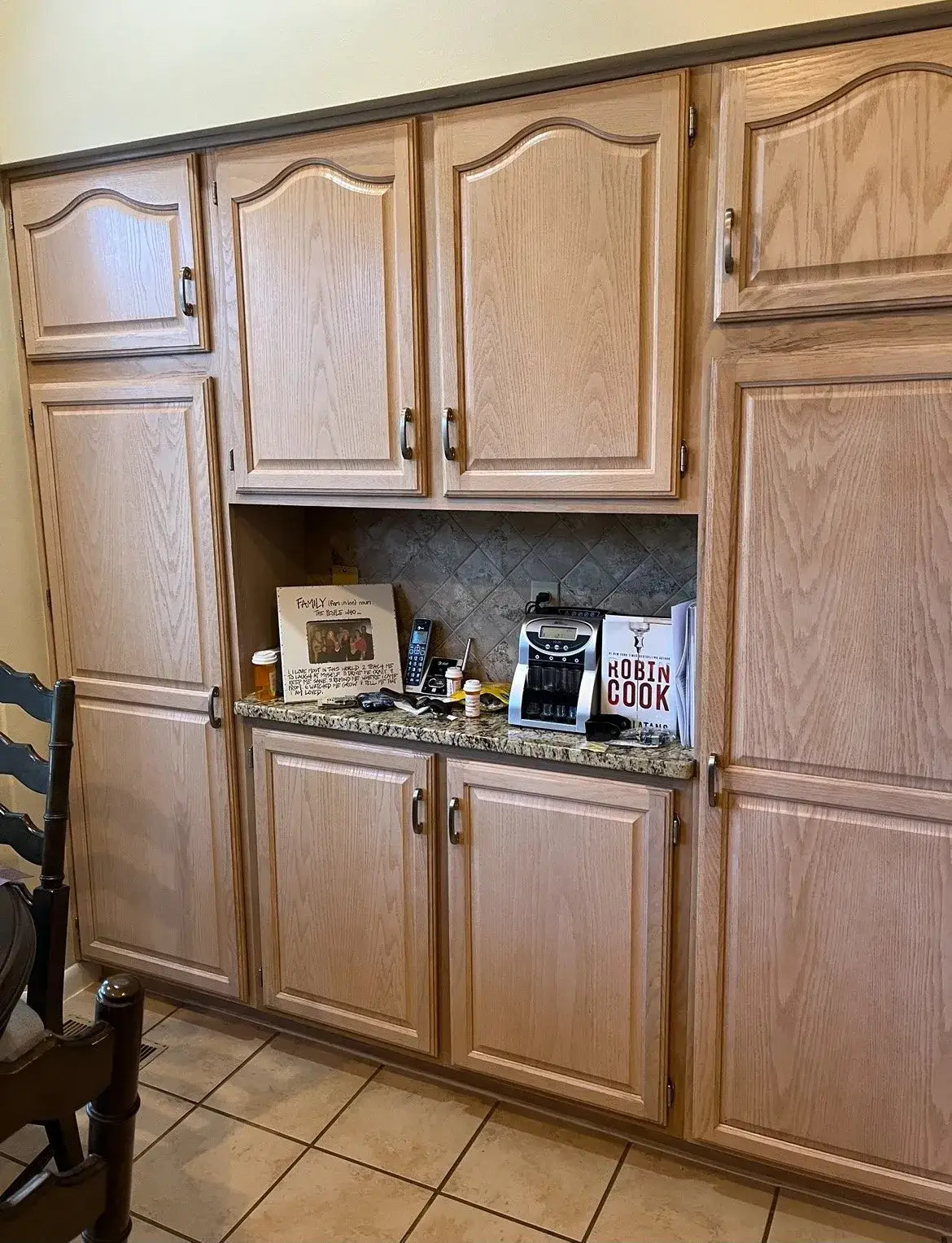 Before: built-in kitchen cabinets: wood painted white