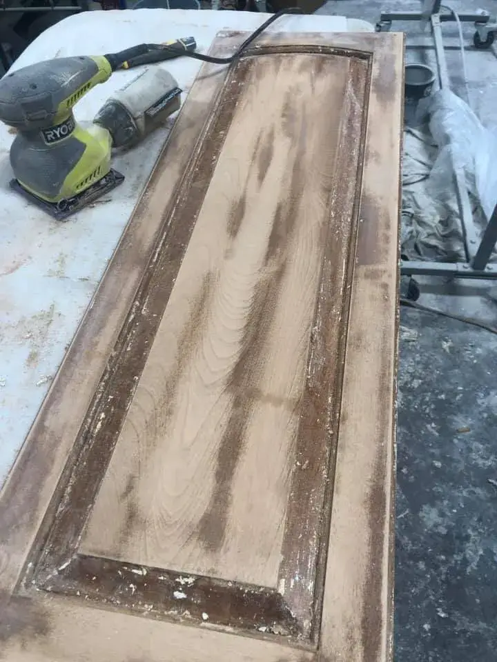 In progress: cabinet doors stripped and sanded in shop