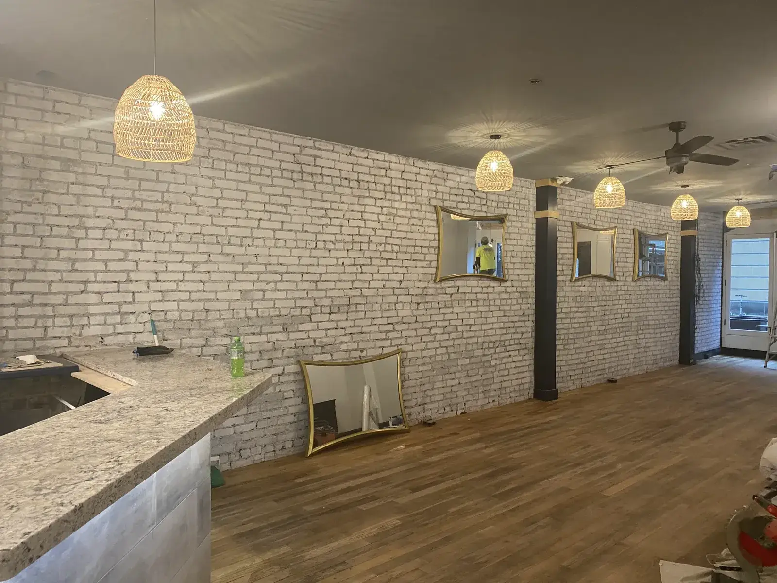 After: commercial space: exposed brick to whitewash