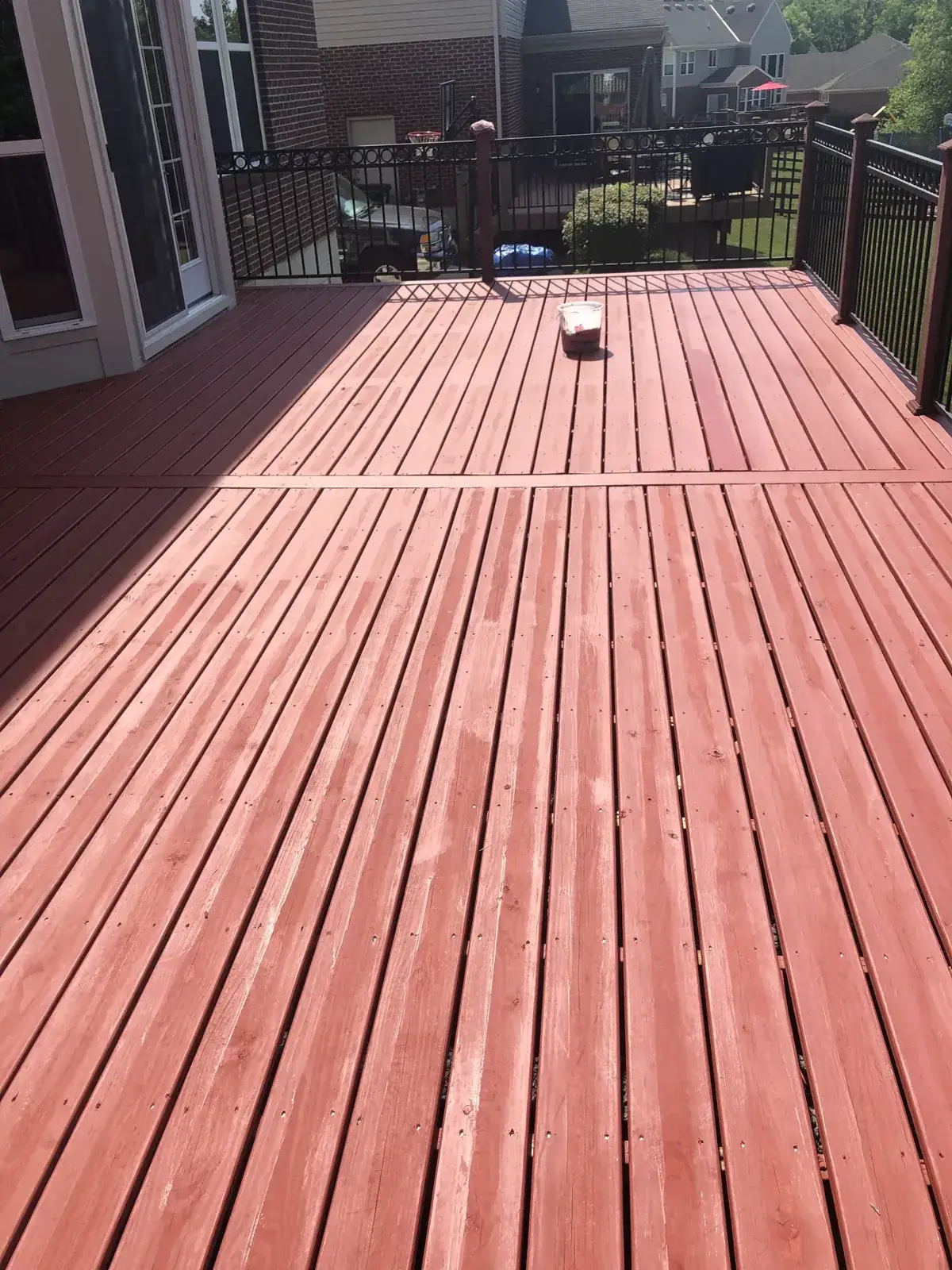 After: deck B: washed, then red solid stain