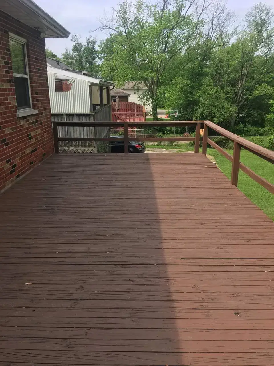 Before: deck D: brown railing deck restained darker