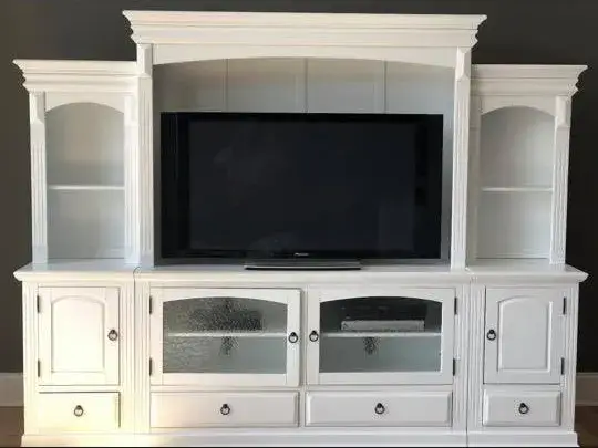 After: entertainment center painted white
