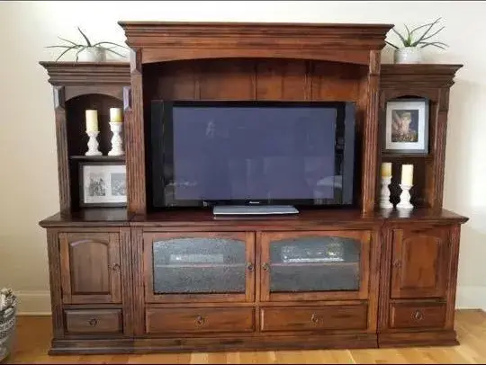 Before: entertainment center painted white