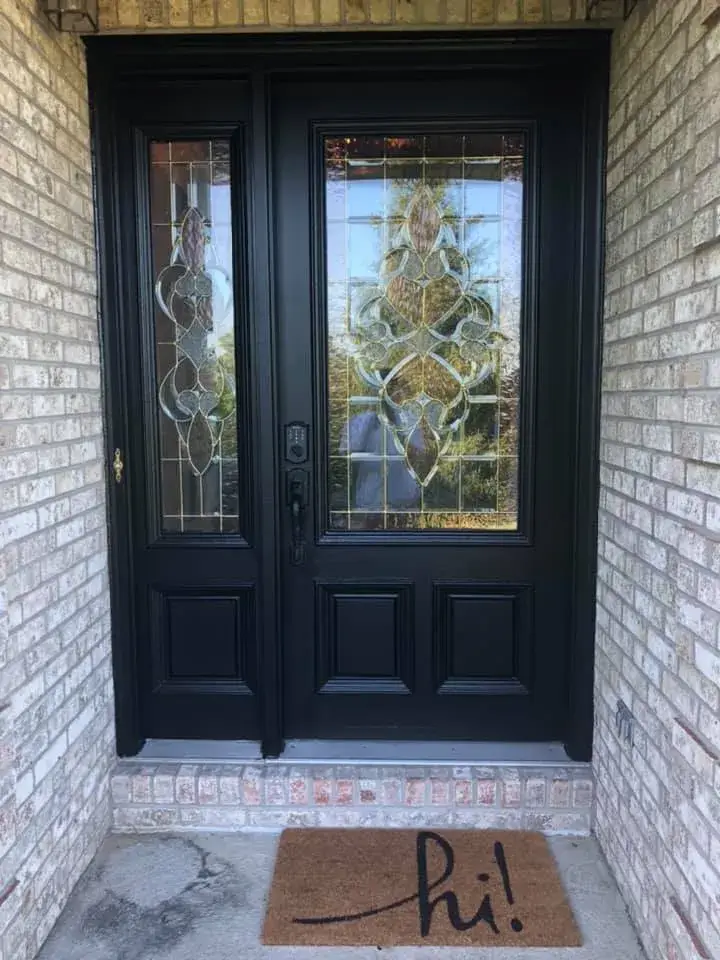 After: front double door with leaded glass painted black