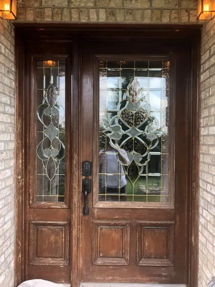 Before: front double door with leaded glass painted black