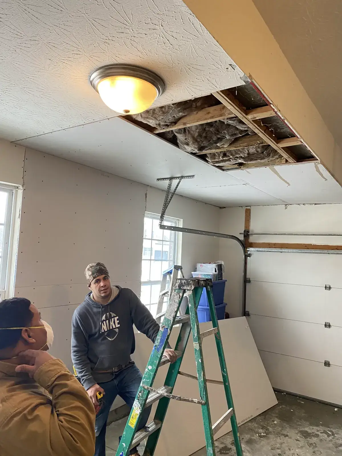 Before: garage ceiling drywall repair