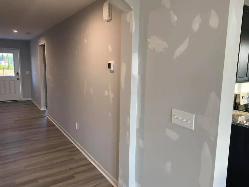 Before: interior walls patched and painted gray