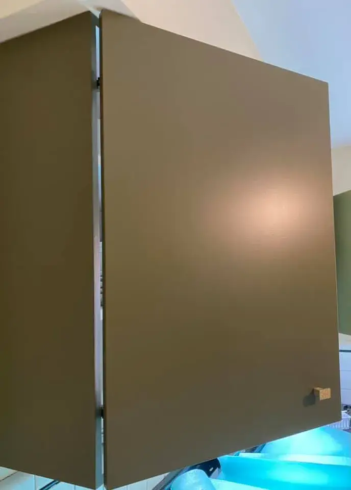 Two matte olive green kitchen cabinet doors installed with a visible gap between them. - My Personal Painter - My Personal Painter In progress: kitchen cabinets: white to olive green