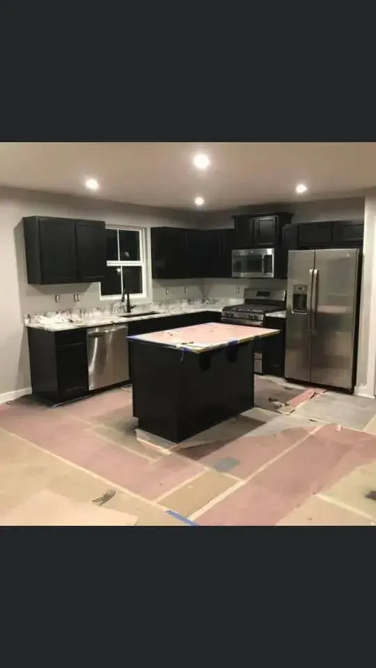 After: kitchen cherry cabinets painted black