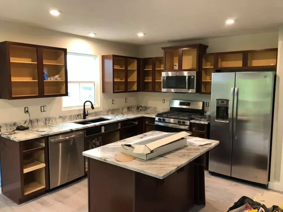 Before: kitchen cherry cabinets painted black