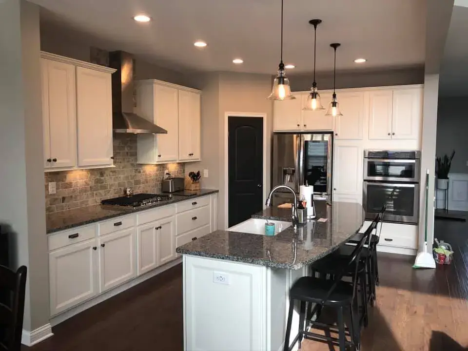 After: kitchen dark cabinets painted white