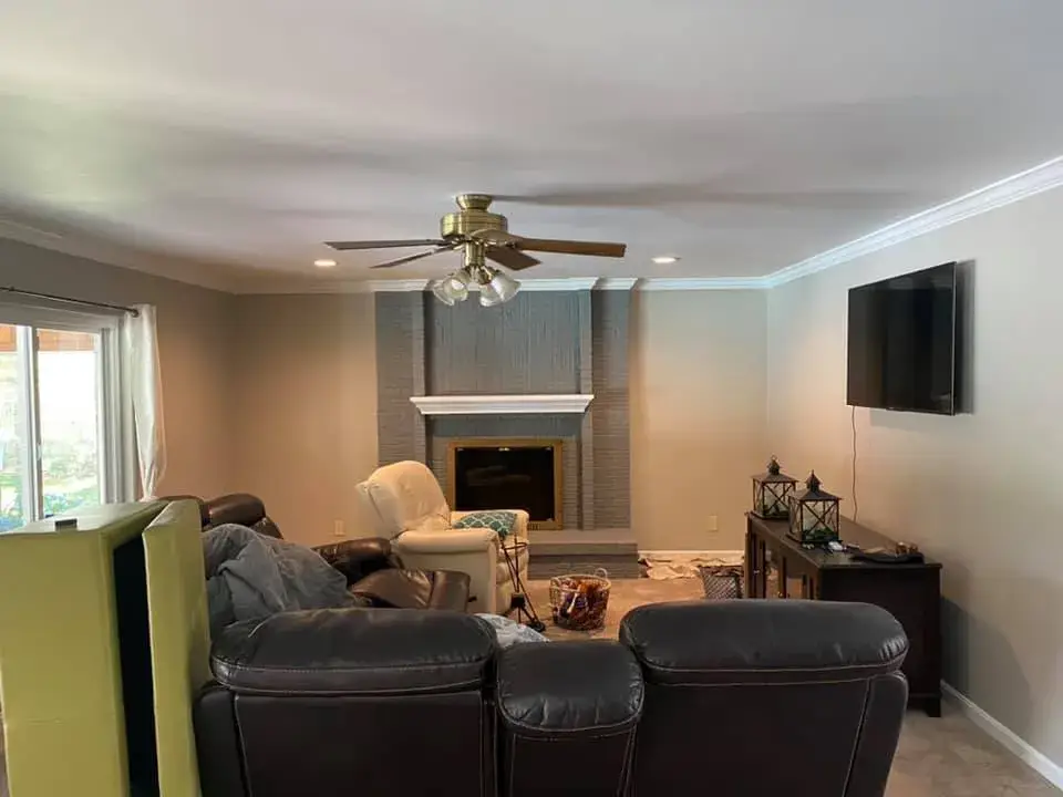 After: kitchen painted white, living room and dining room repainted
