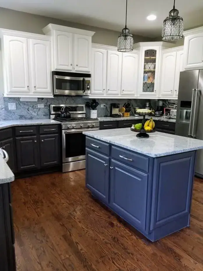 After: kitchen white uppers, dark lowers and a blue island