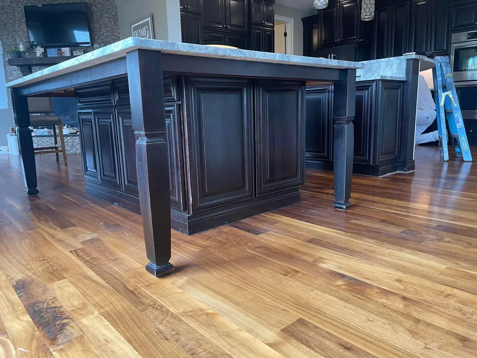 After: kitchen with two islands: white cabinets painted dark