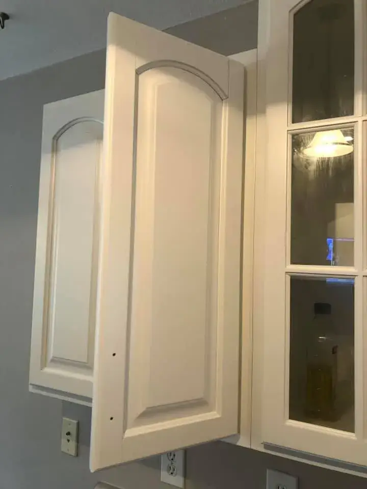 After: kitchen wood cabinets painted white uppers, dark lowers