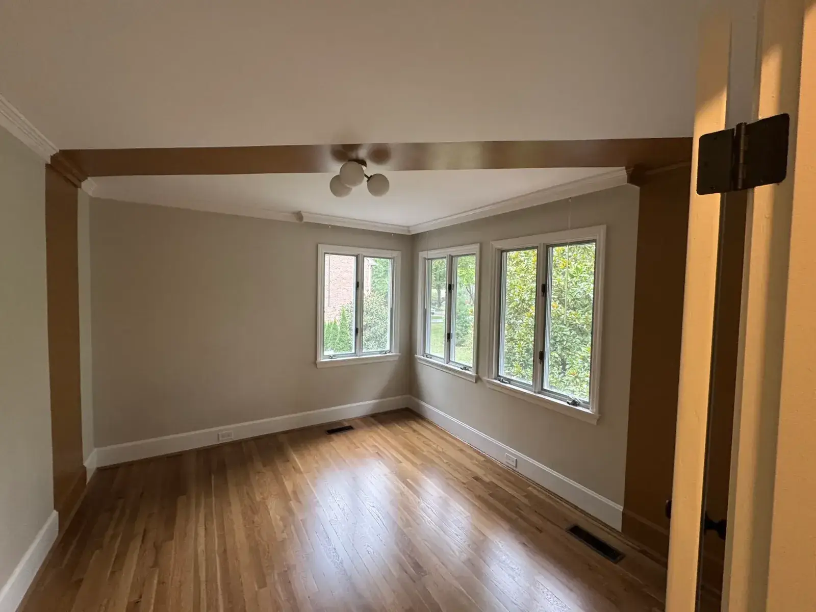 After: navy accent wall, two-tone bedroom and living room