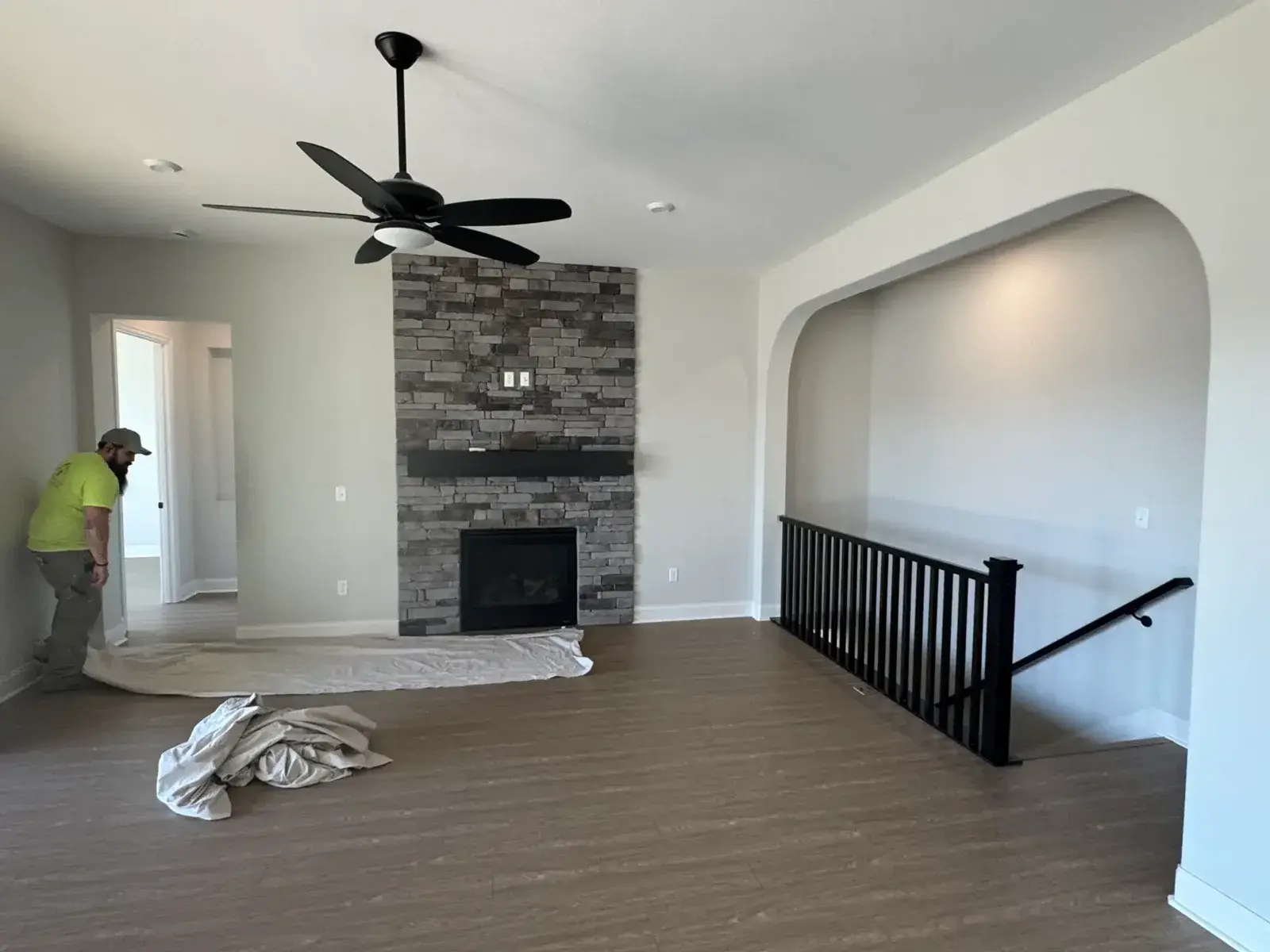 In progress: new-build house: black archway, accent walls and doors