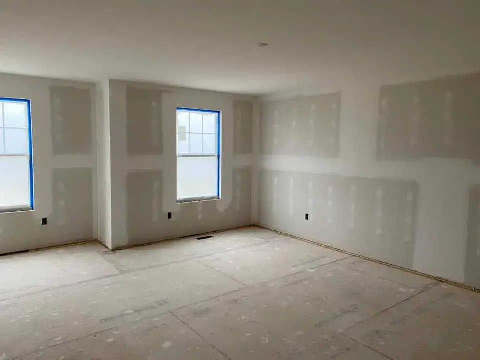 Before: new-construction interior walls painted