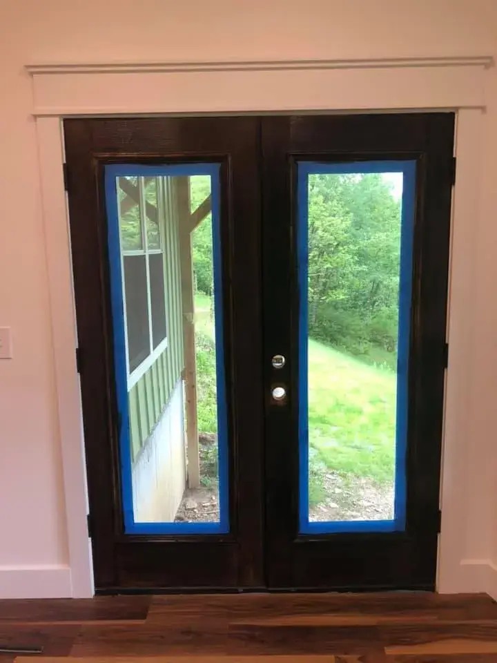 Before: new house: interior and exterior doors stained dark