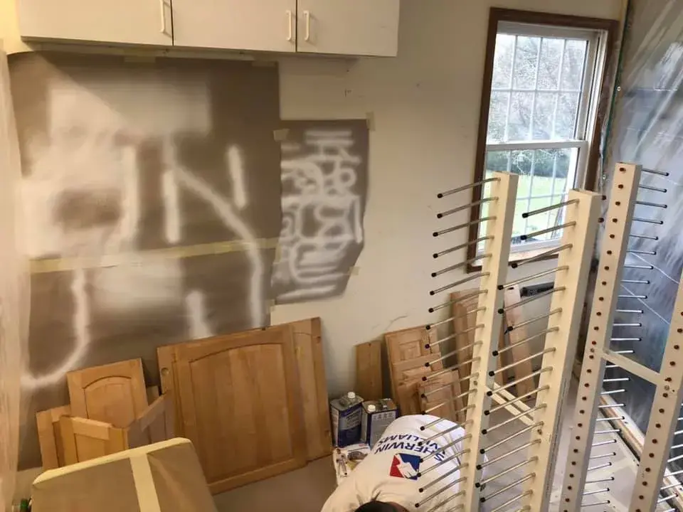 In progress: oak cabinet doors sprayed in a spray booth