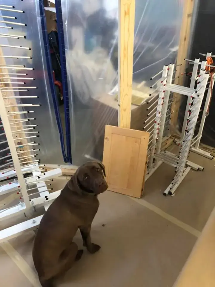 In progress: oak cabinet doors sprayed in a spray booth