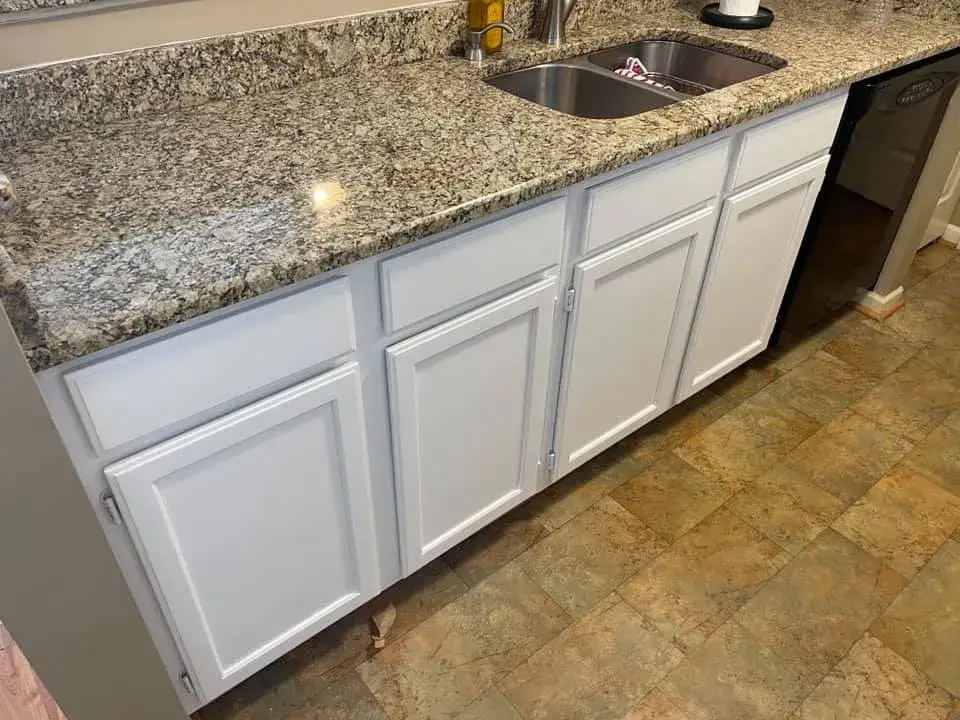 After: oak kitchen cabinets painted white