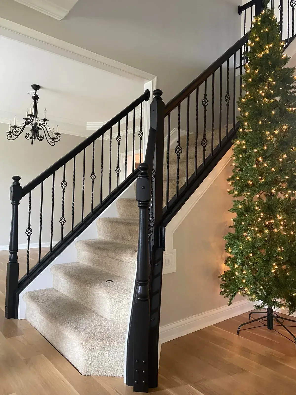 After: staircase and balcony railing: oak to black, plus dining room