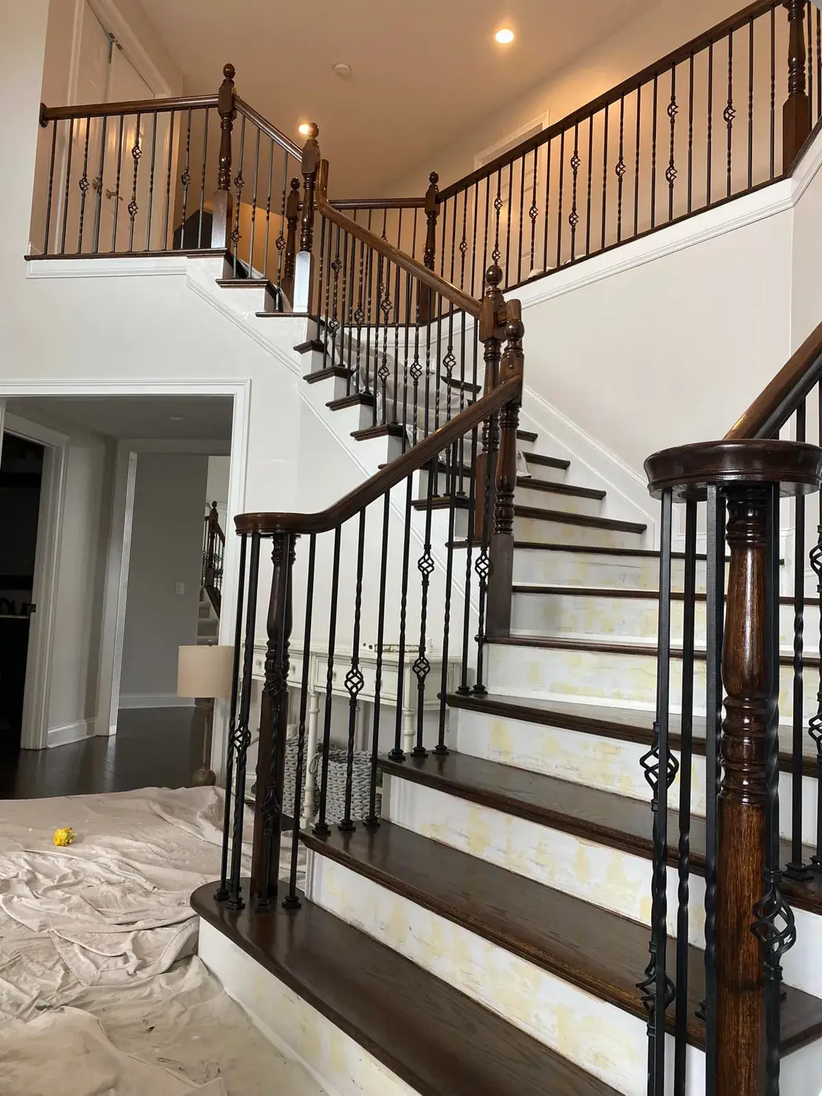 After: staircase: oak handrail and newels refinished dark