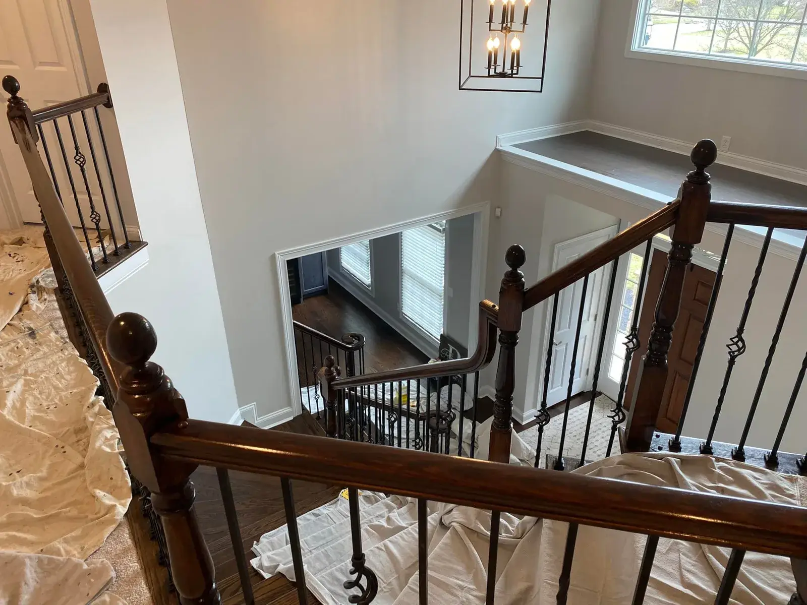 After: staircase: oak handrail and newels refinished dark