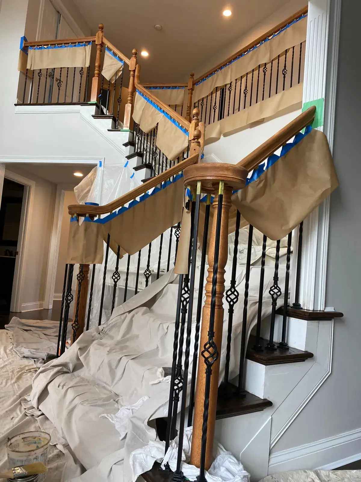 In progress: staircase: oak handrail and newels refinished dark