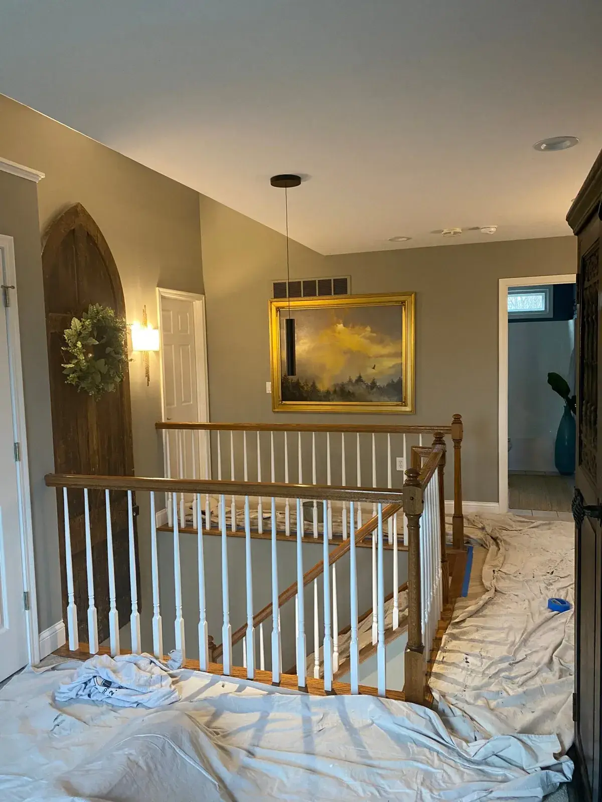Before: staircase railing painted black