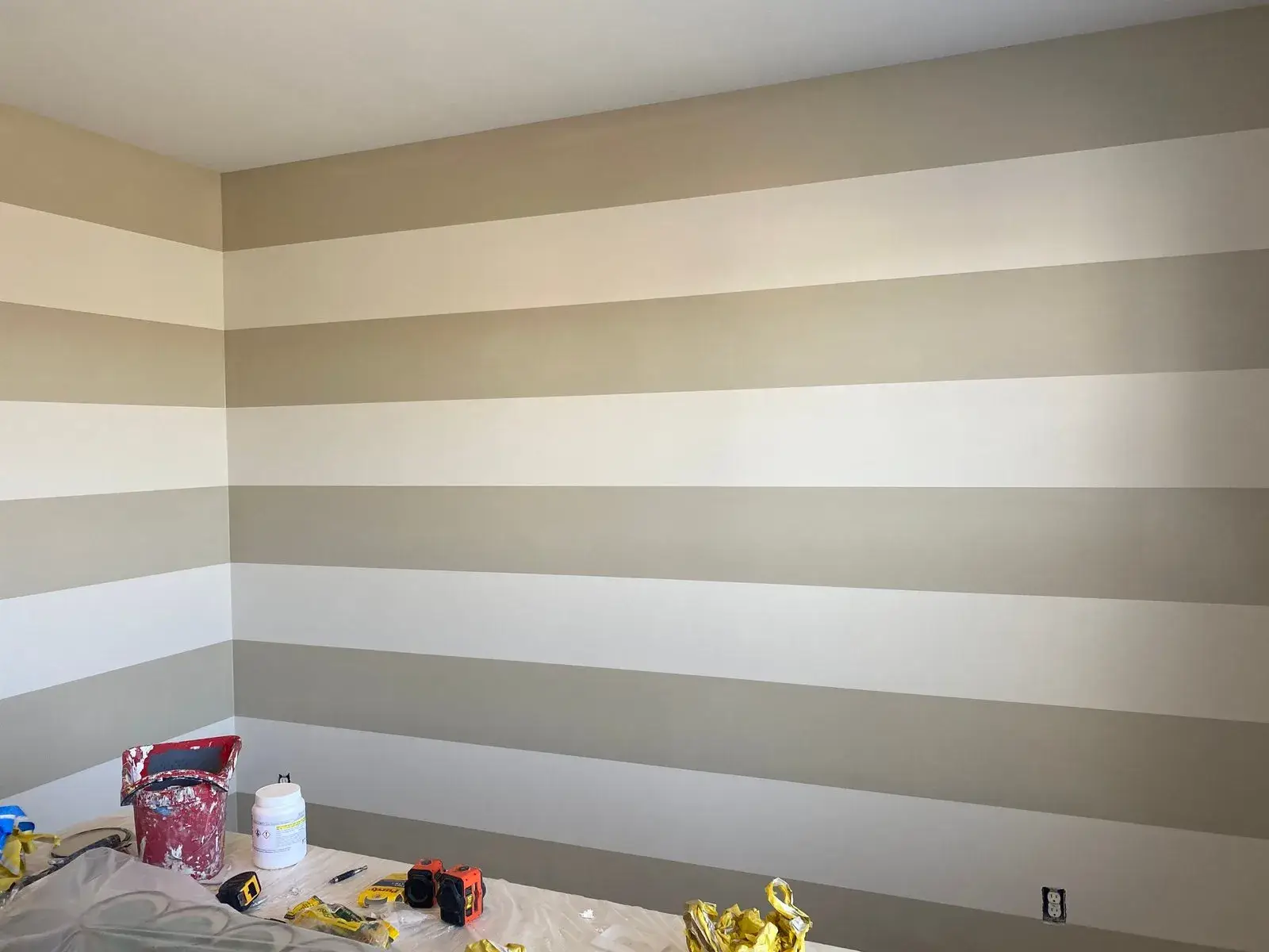 After: staircase with black spindles, dining room and bedroom stripes, bathroom vanity