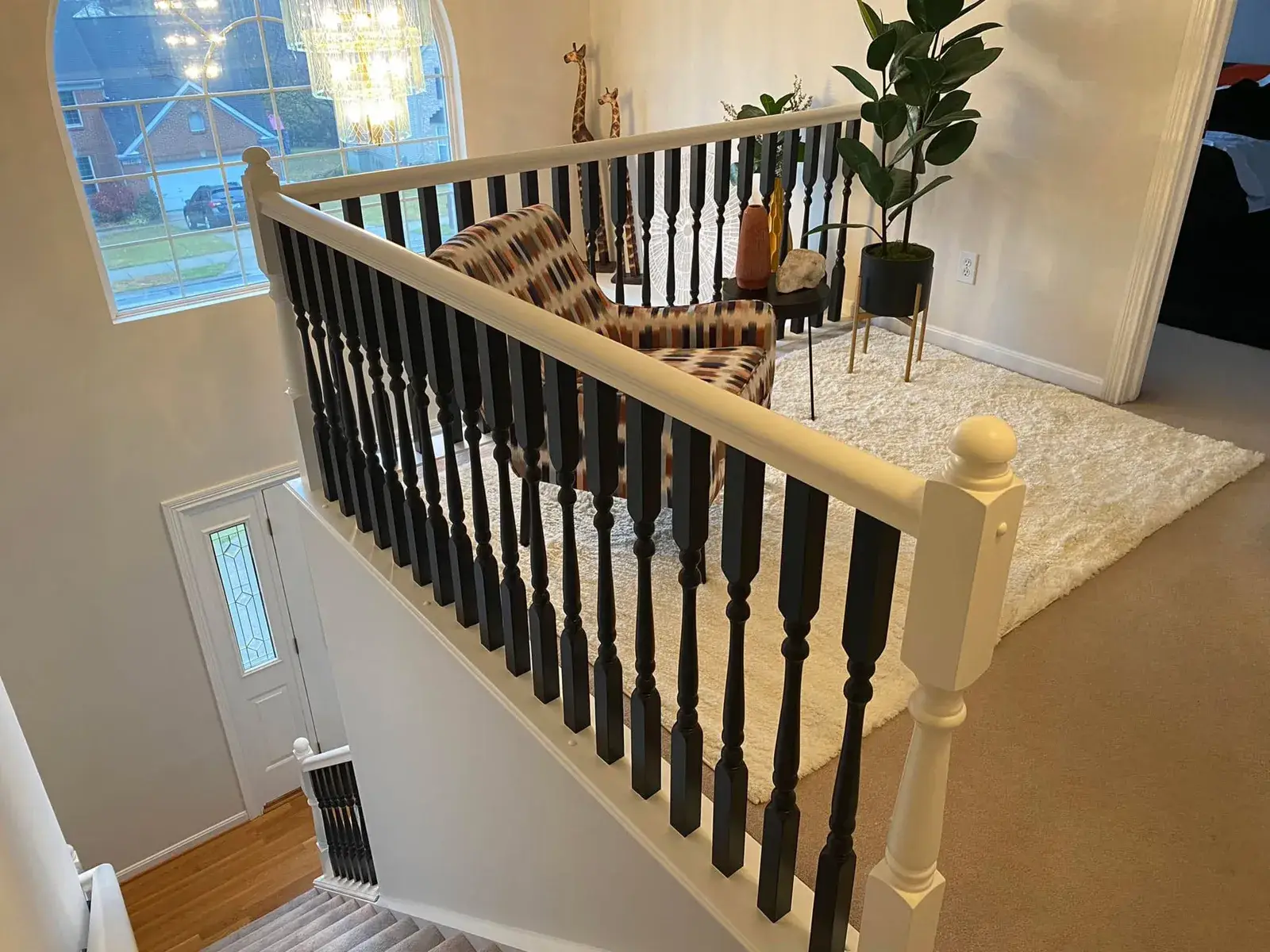 After: staircase with black spindles, dining room and bedroom stripes, bathroom vanity