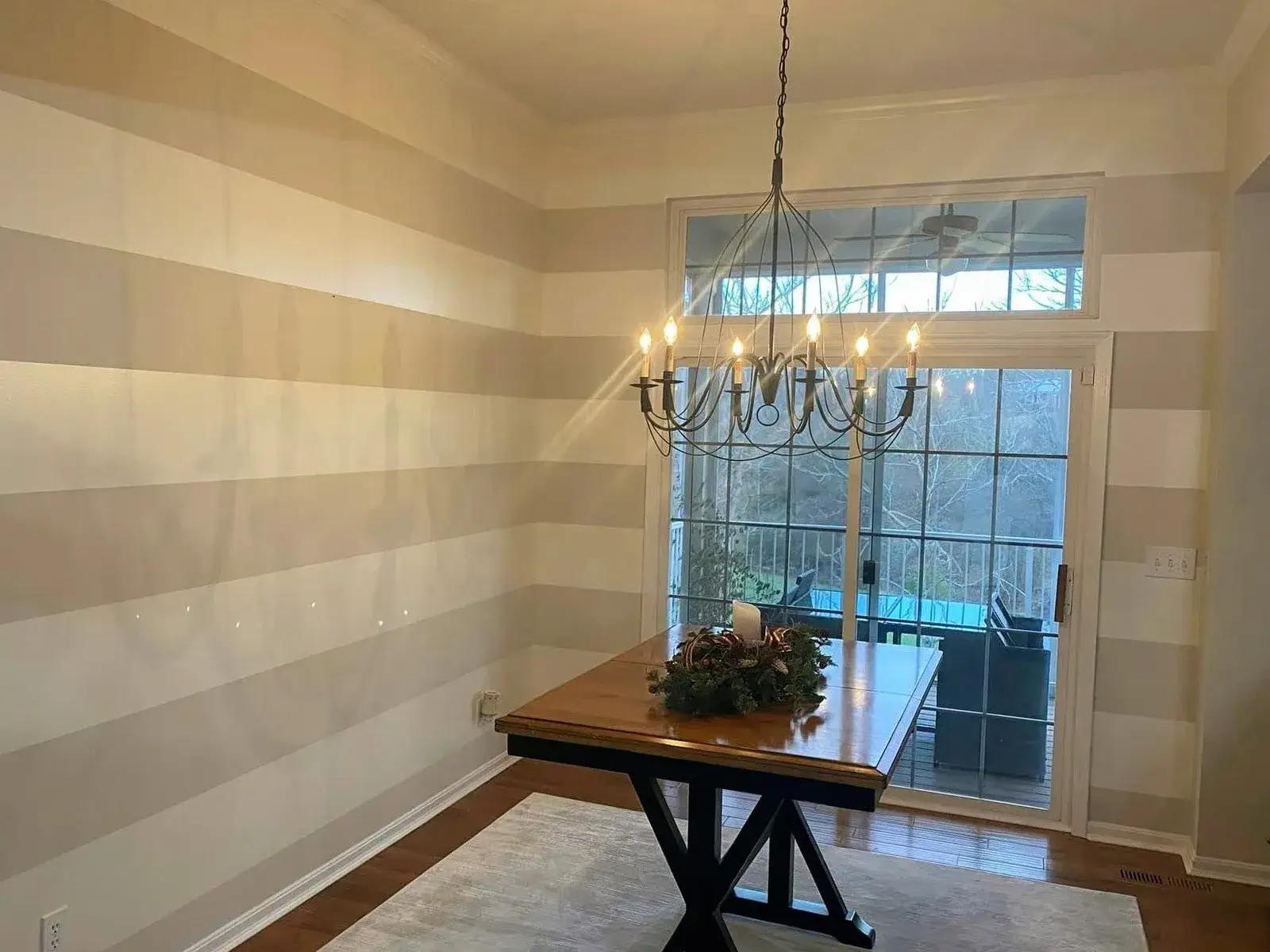 After: staircase with black spindles, dining room and bedroom stripes, bathroom vanity