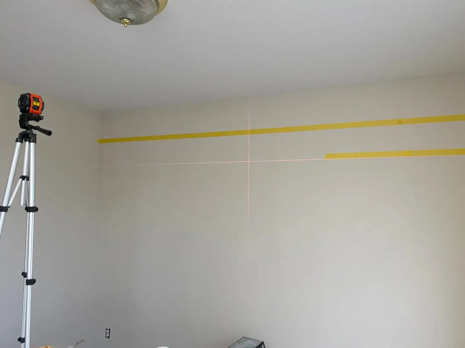 In progress: staircase with black spindles, dining room and bedroom stripes, bathroom vanity