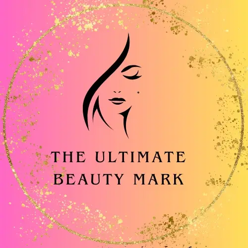 Logo for The Ultimate Beauty Mark featuring a womans profile inside a gold speckled circle on a pink and yellow gradient. - My Personal Painter - My Personal Painter The Ultimate Beauty Mark logo