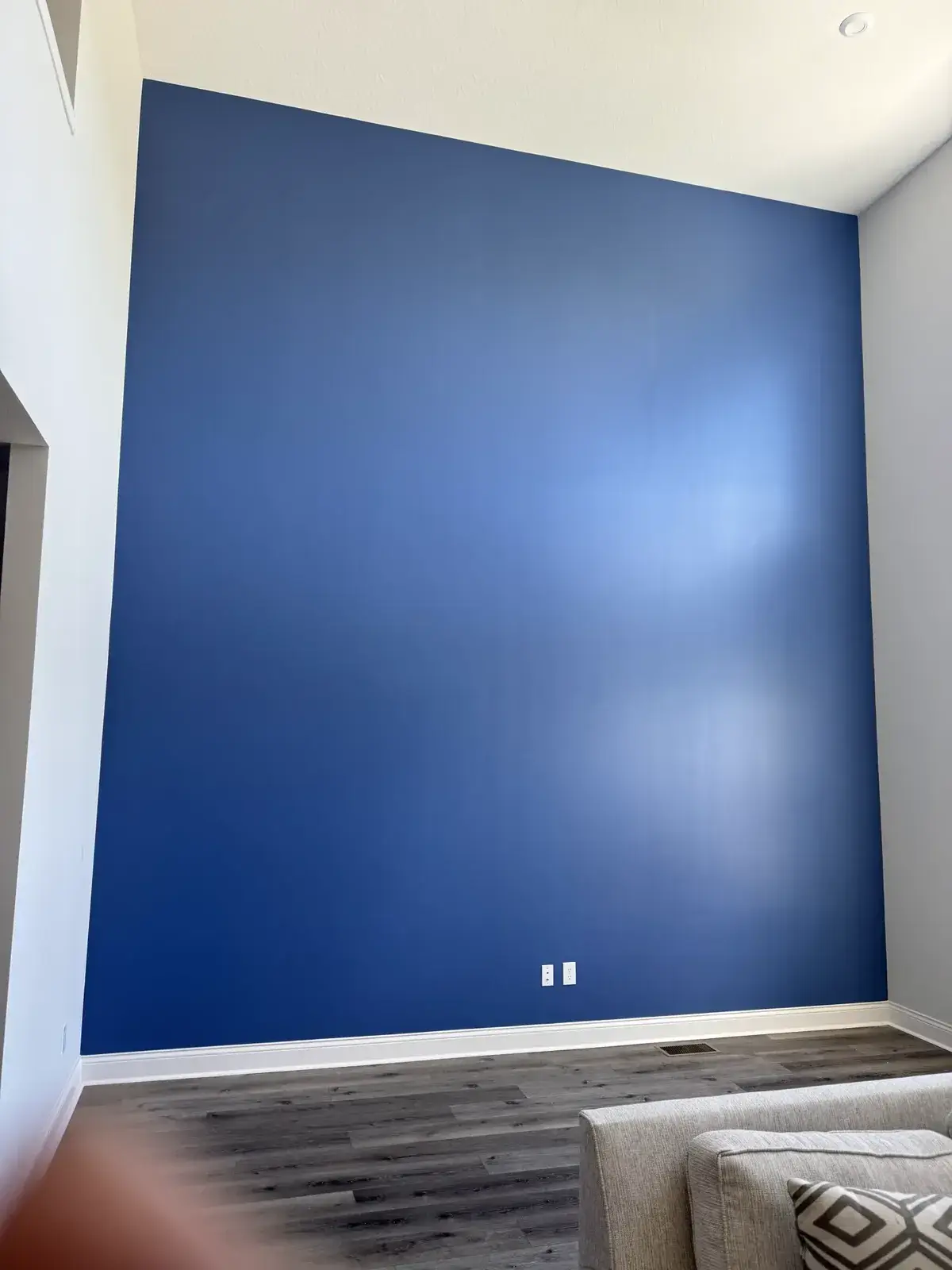 After: two-story blue accent wall