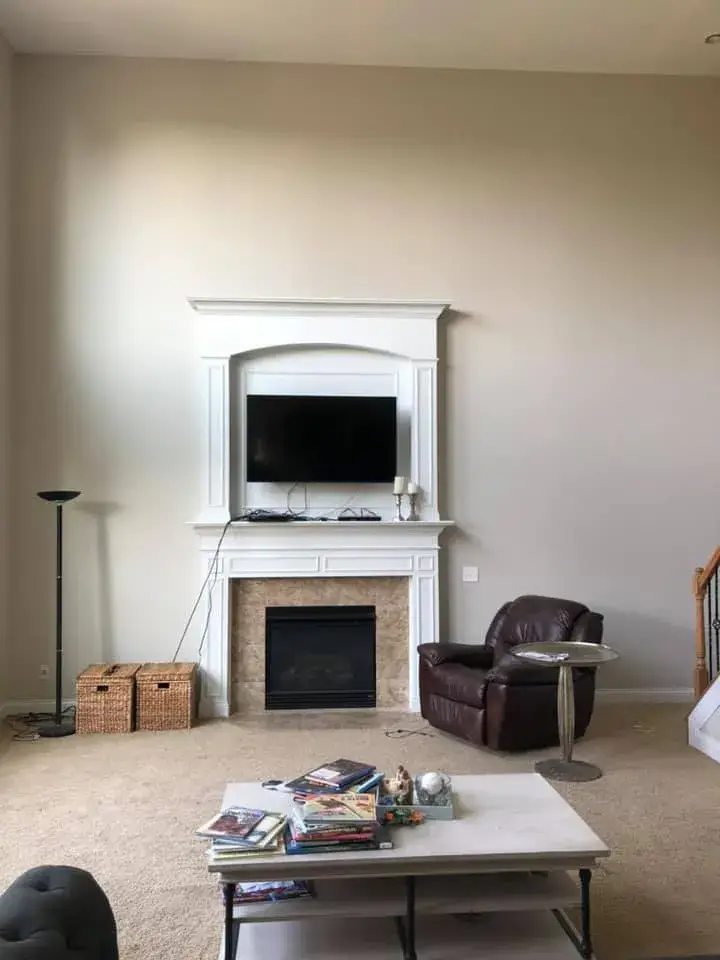 After: two-story foyer, stairwell and great room repainted; bedrooms painted beige