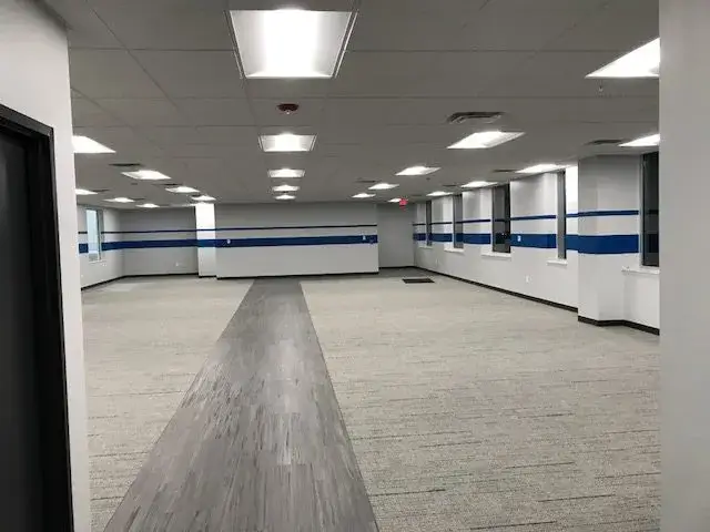After: warehouse: tilt-up exterior walls and interior walls, columns and offices painted