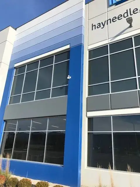 After: warehouse: tilt-up exterior walls and interior walls, columns and offices painted